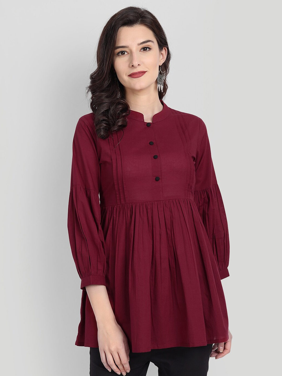 

githaan Women Maroon Solid Mandarin Collar Empire Longline Top