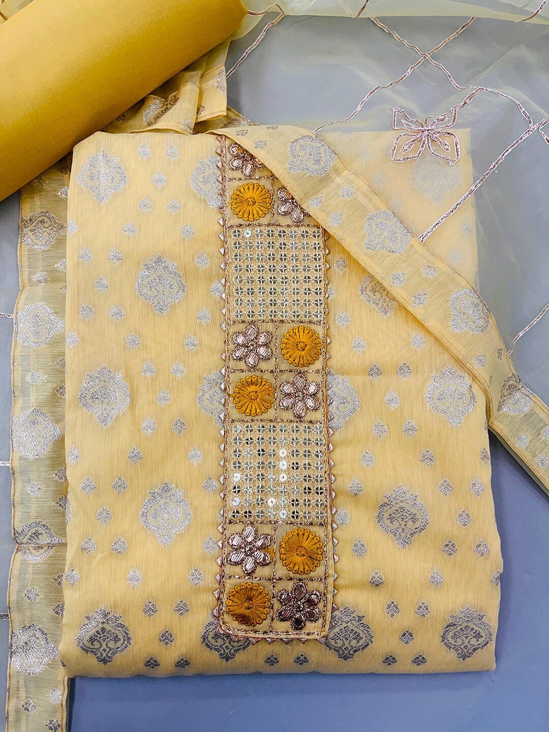 

JATRIQQ Yellow & Silver-Toned Art Silk Unstitched Dress Material