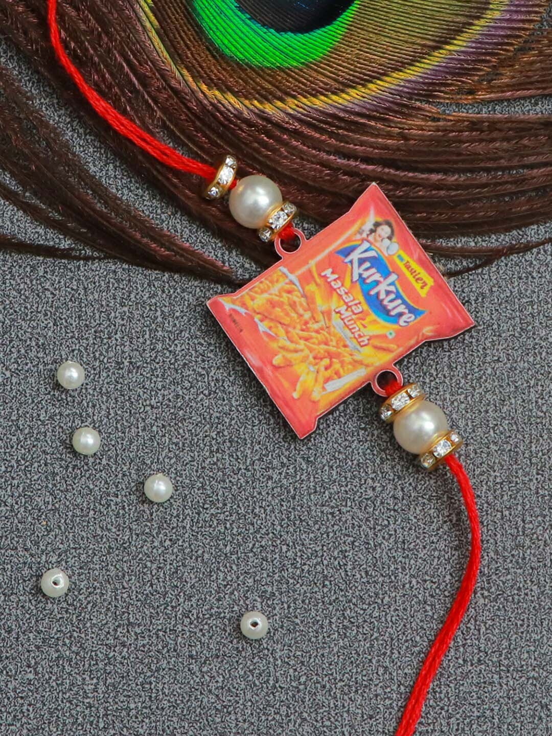 

The Magic Wand Boys Red Kurkure Design Rakhi