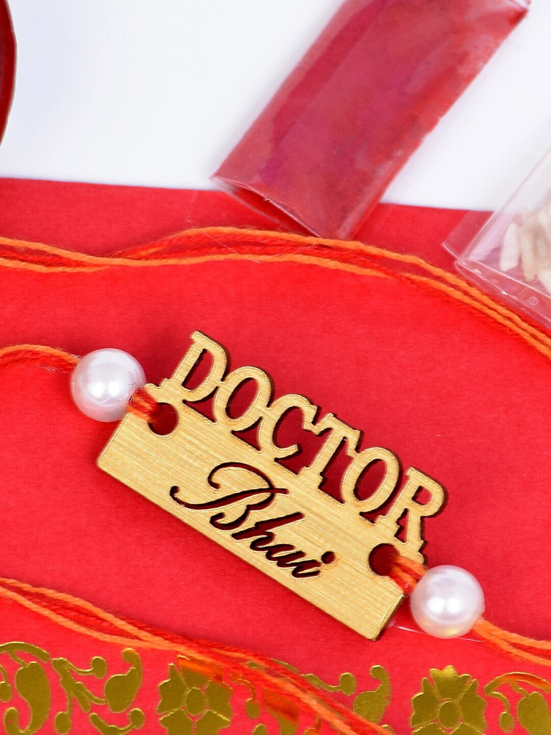 

The Magic Wand Boys Gold-Toned and Orange Rakhi