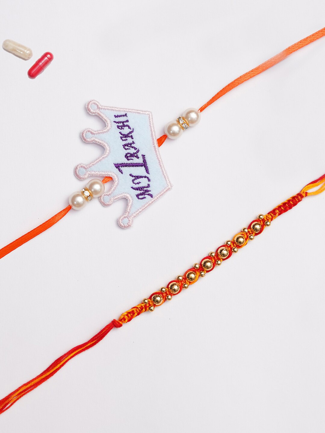 

The Magic Wand Set Of 2 Kids Red Crown Applique Rakhi