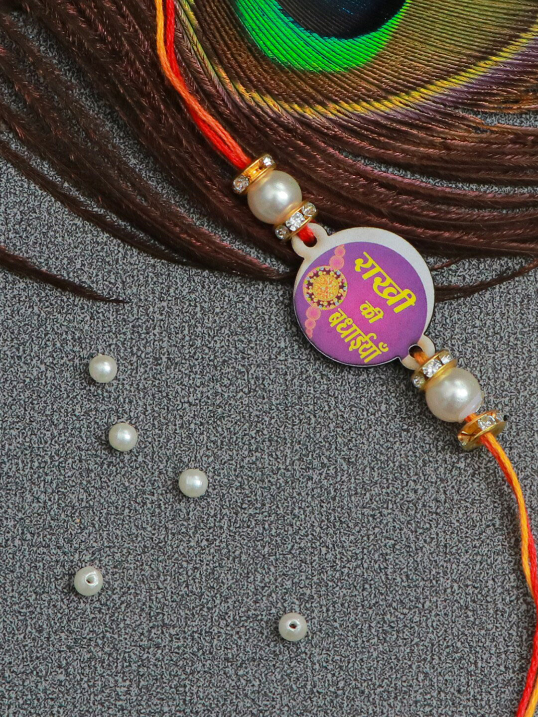 

The Magic Wand Purple & Red Beaded Thread Rakhi With Roli-Chawal