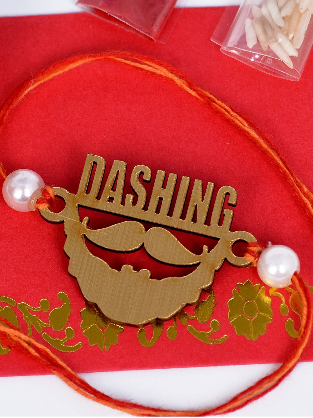 

The Magic Wand Boys Gold-Toned & Red Dashing Mustache Thread Rakhi