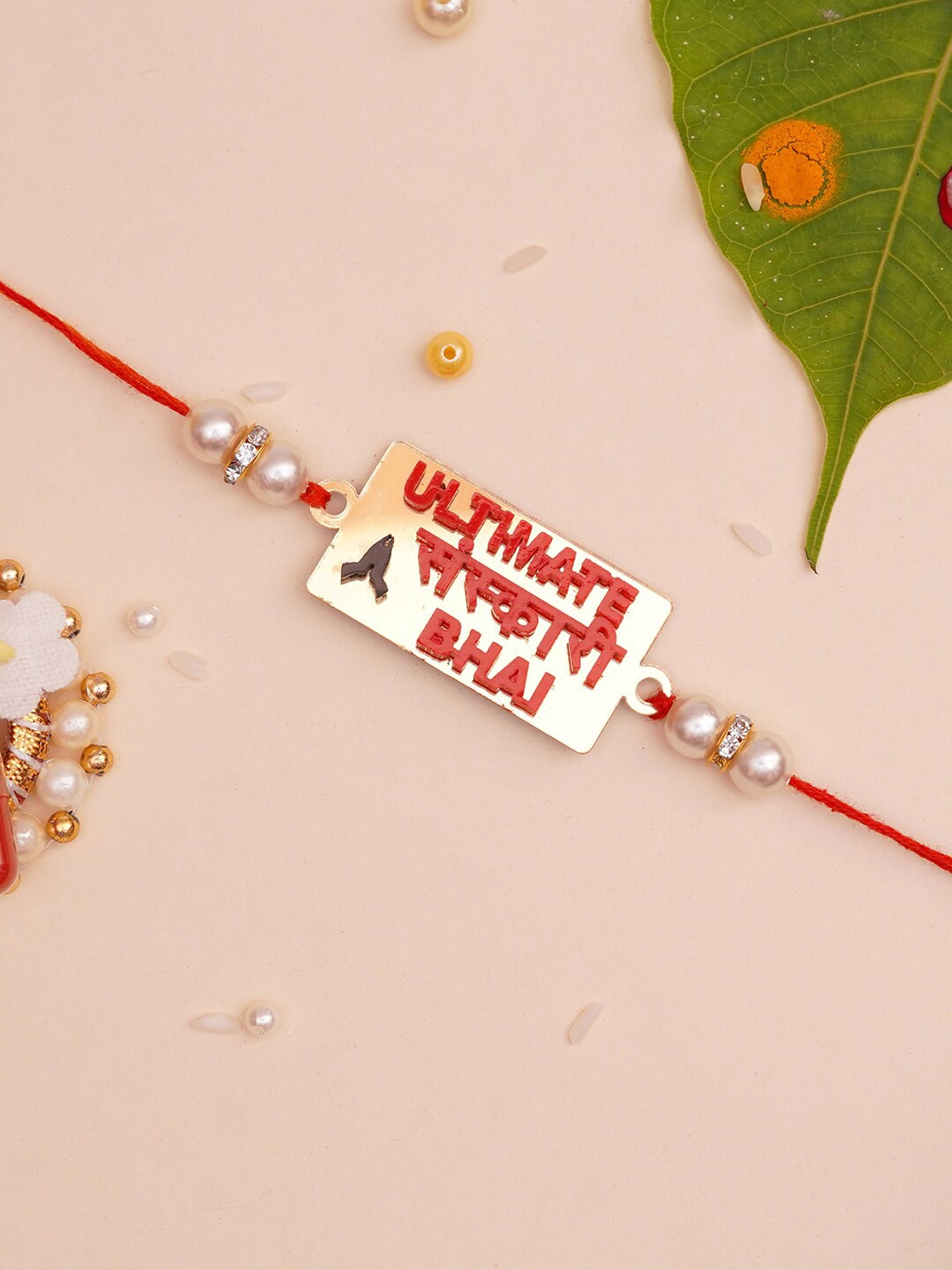 

The Magic Wand Boys Gold-Toned & Red Beaded Bhai-Charm Rakhi