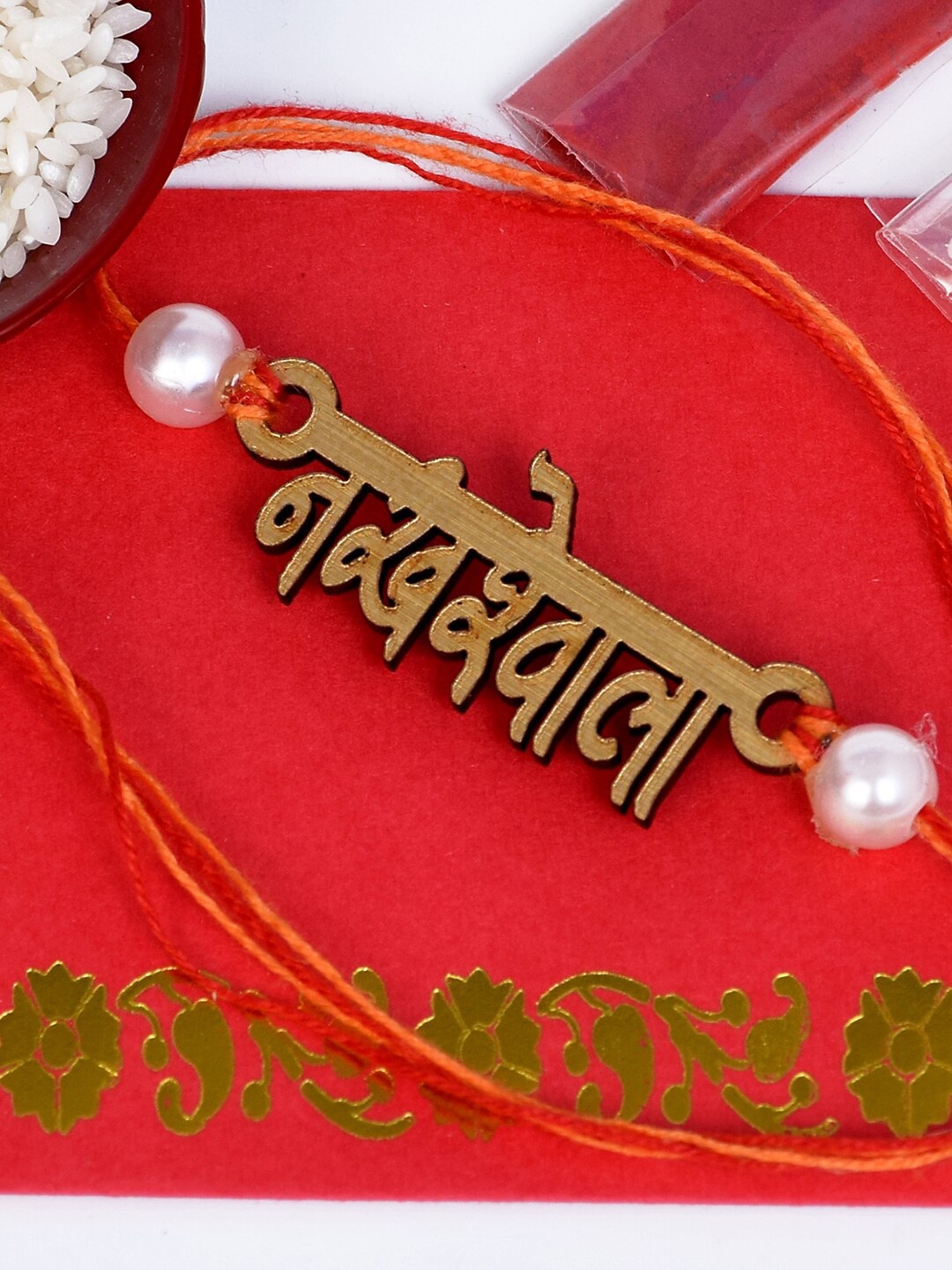 

The Magic Wand Boys Gold-Toned & White Pearl Beaded Rakhi