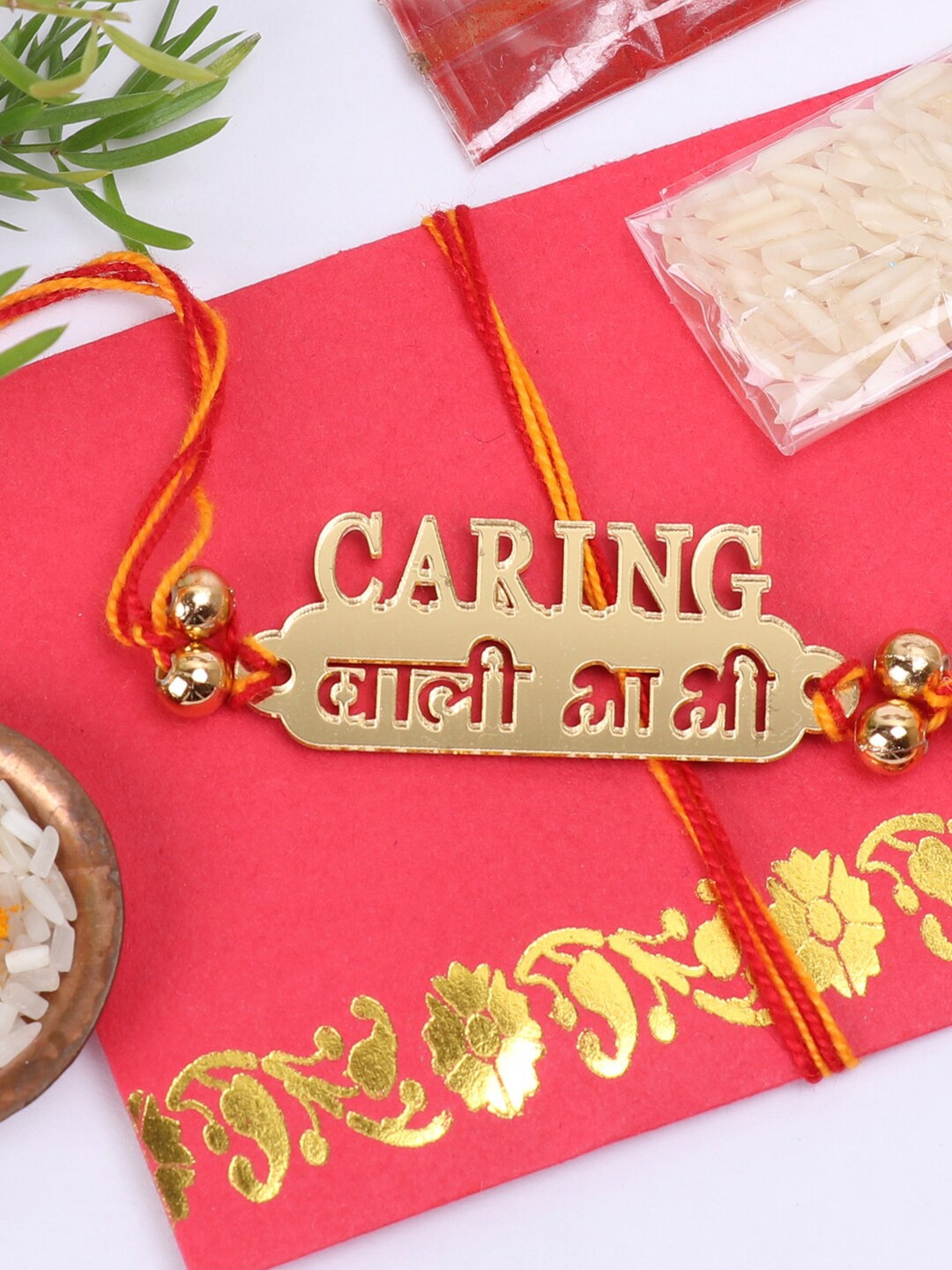 

The Magic Wand Boys Gold-Toned & Red Engraved Bhabhi Rakhi