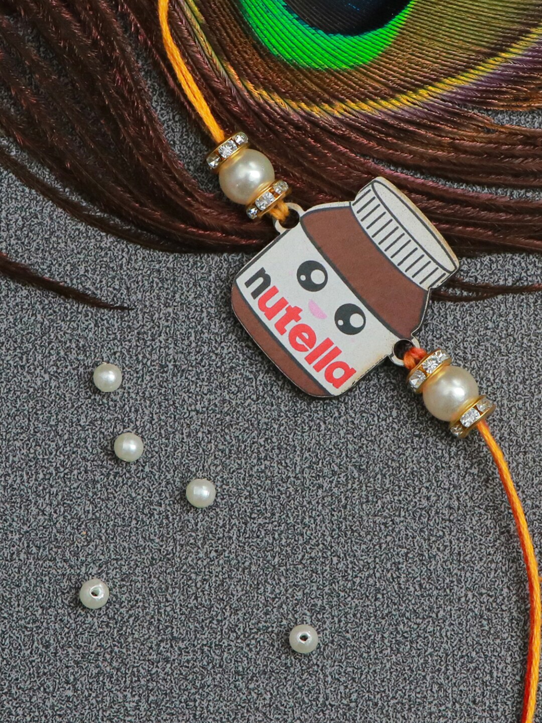

The Magic Wand Brown & White Pearls beaded Nutella Rakhi