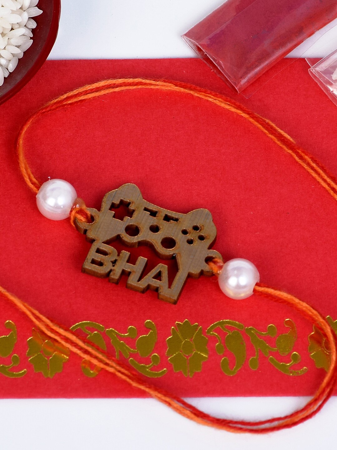 

The Magic Wand Boys Orange & White Beaded Rakhi