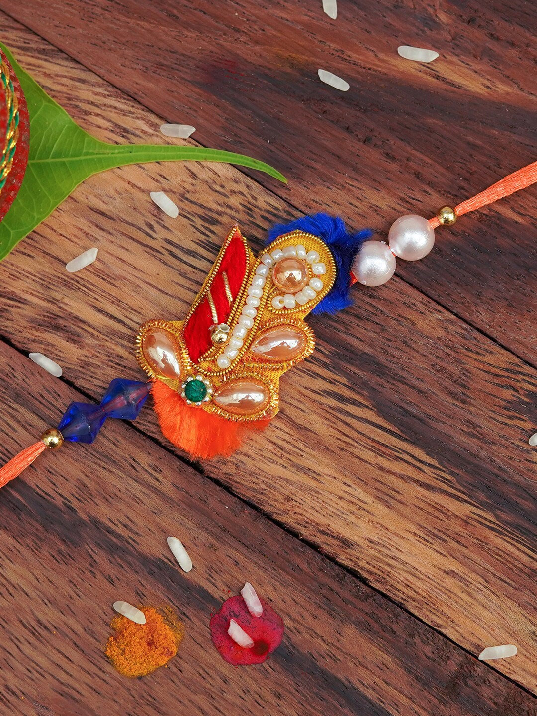 

The Magic Wand Boys Blue & Orange Beaded Rakhi