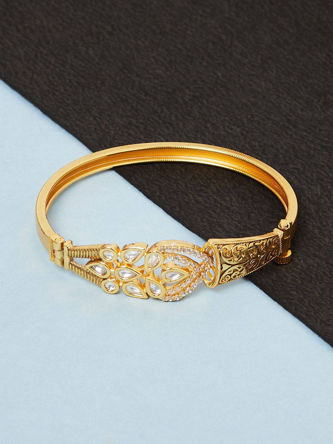 

Voylla Women Gold-Toned & White Brass Gold-Plated Bangle