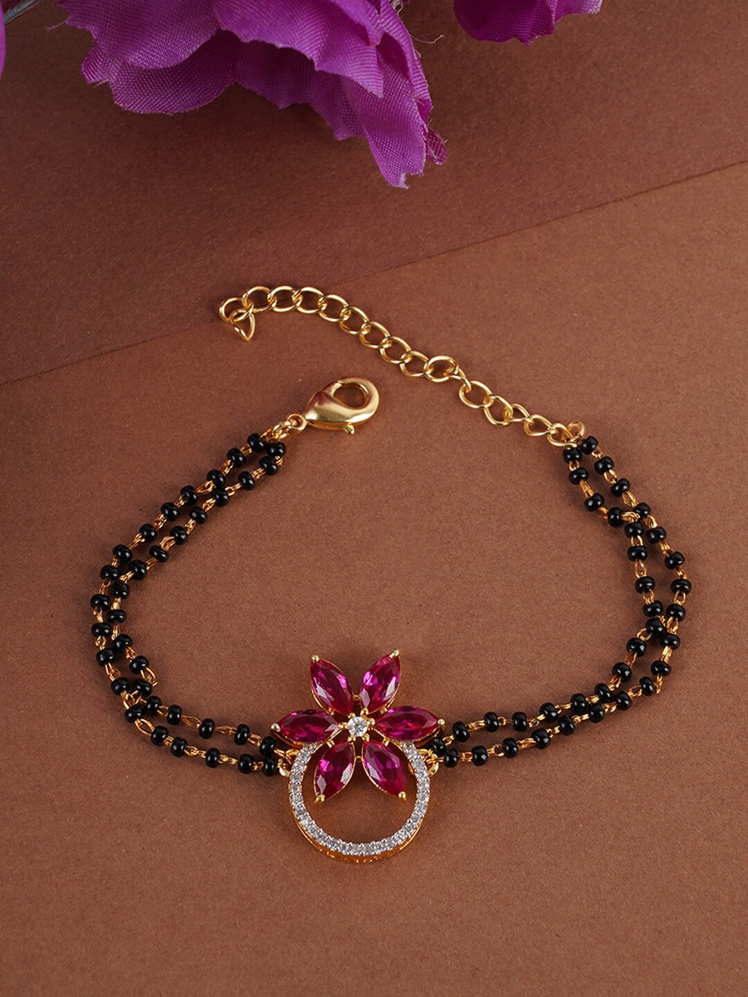 

Voylla Women Gold-Toned & Black Brass Gold-Plated Wraparound Bracelet