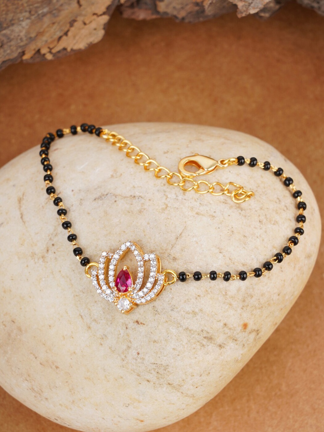 

Voylla Women Gold-Toned & Pink Brass Gold-Plated Link Bracelet