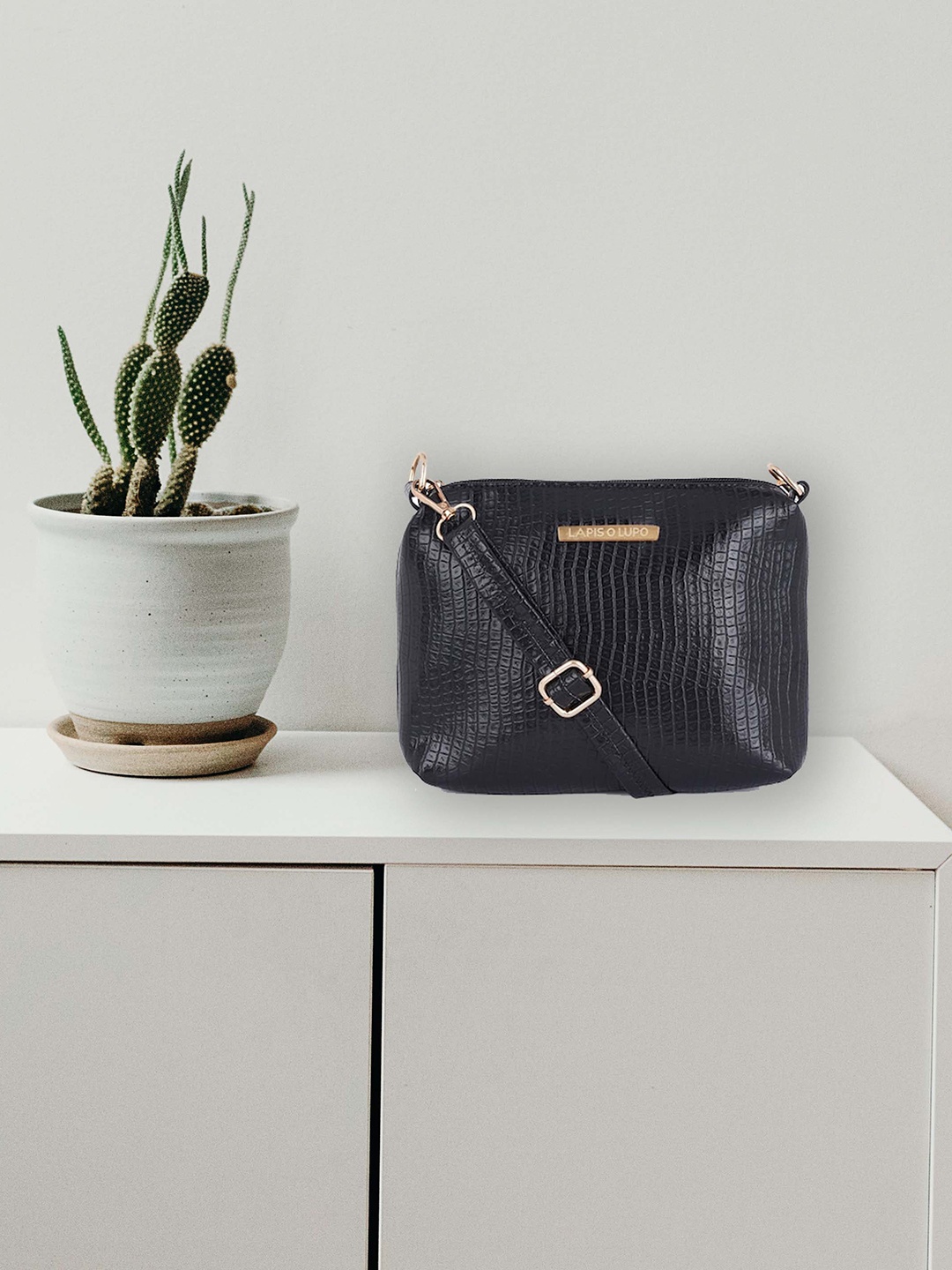 

Lapis O Lupo Women Black Textured Structured Sling Bag