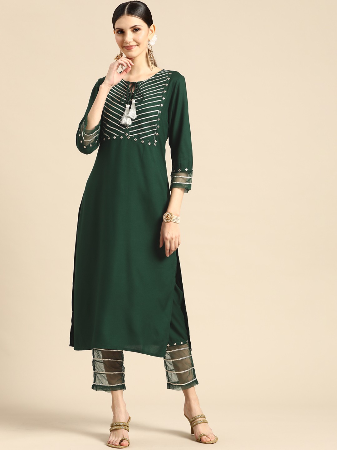 

Sangria Women Green Yoke Design Gotta Patti Kurta with Trousers