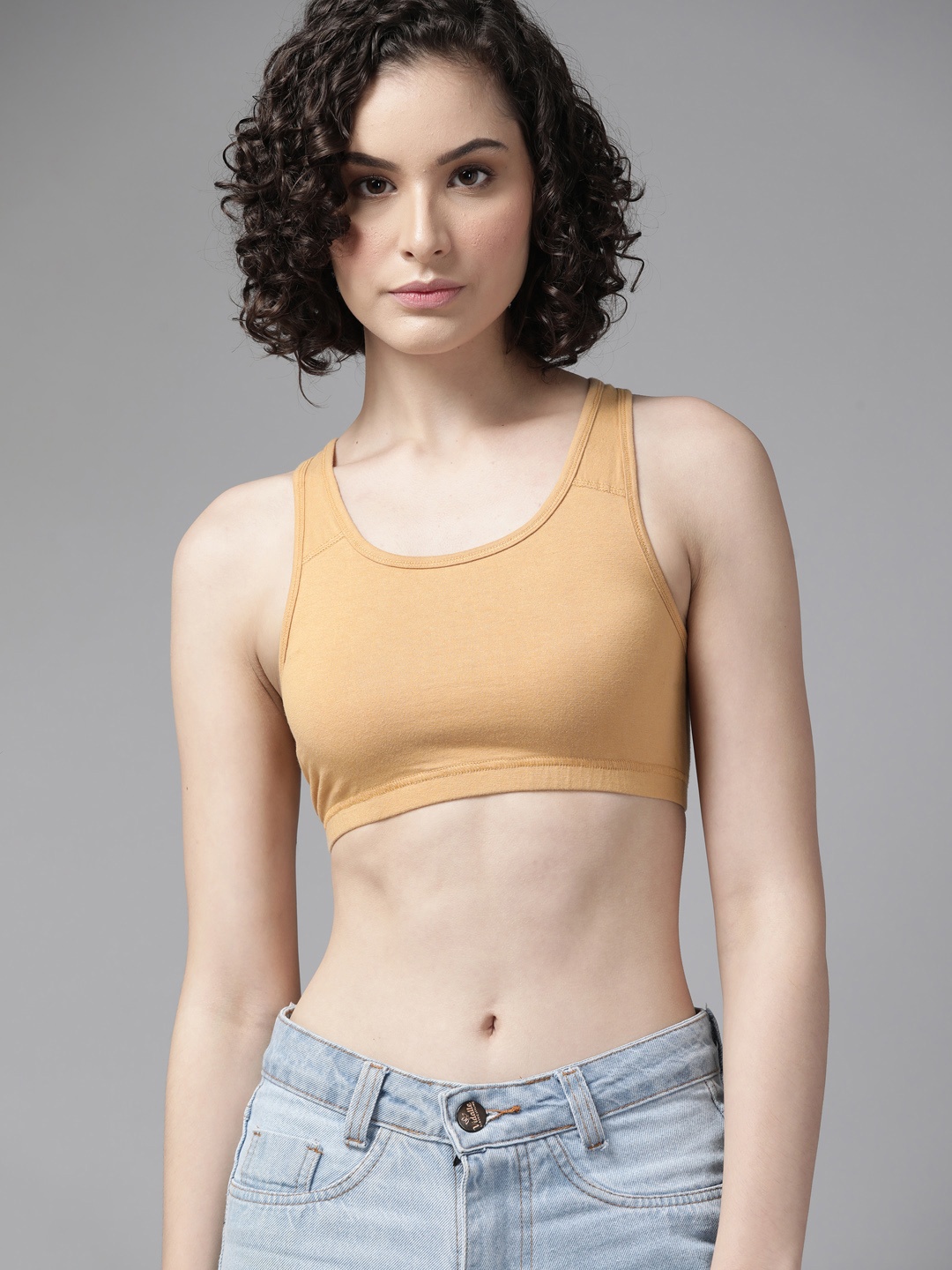 

Roadster Beige Solid Sports Bra