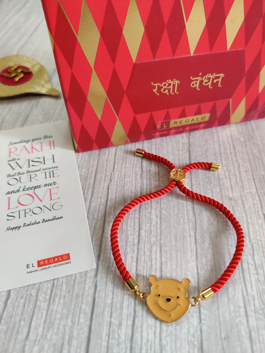 

EL REGALO Kids Red & Gold-Toned Beaded Pooh Rakhi