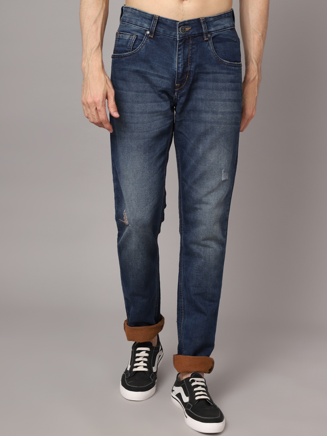 

Cantabil Men Blue Mildly Distressed Light Fade Jeans