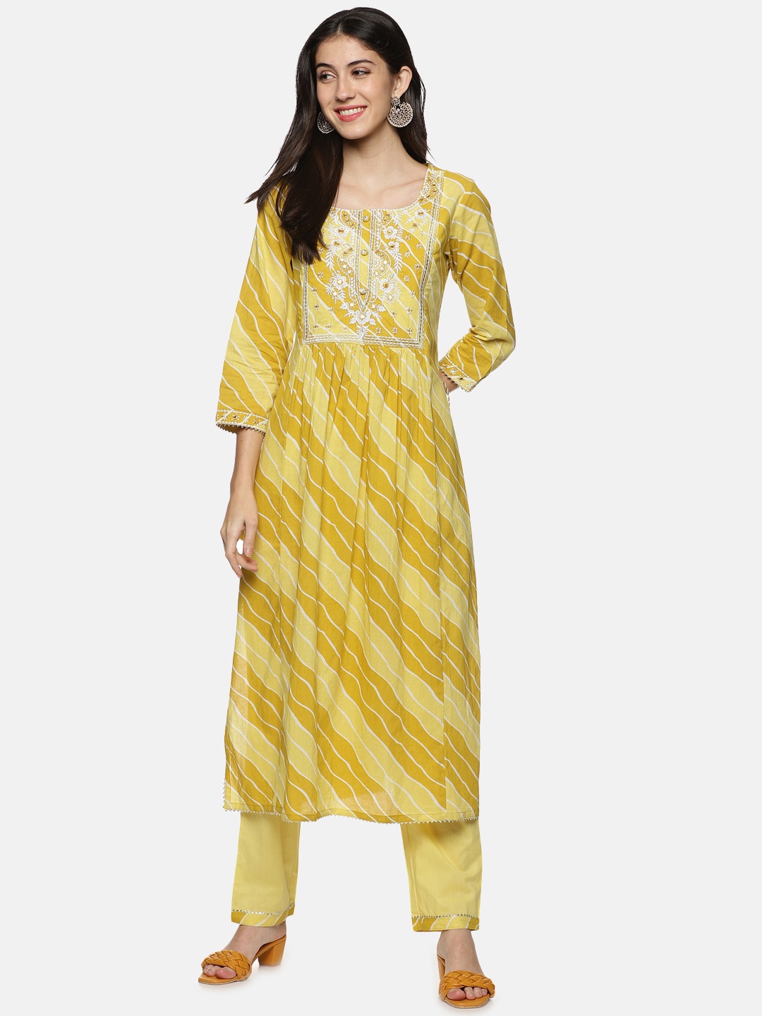 

Palakh Women Yellow Striped Pure Cotton Kurti with Trousers