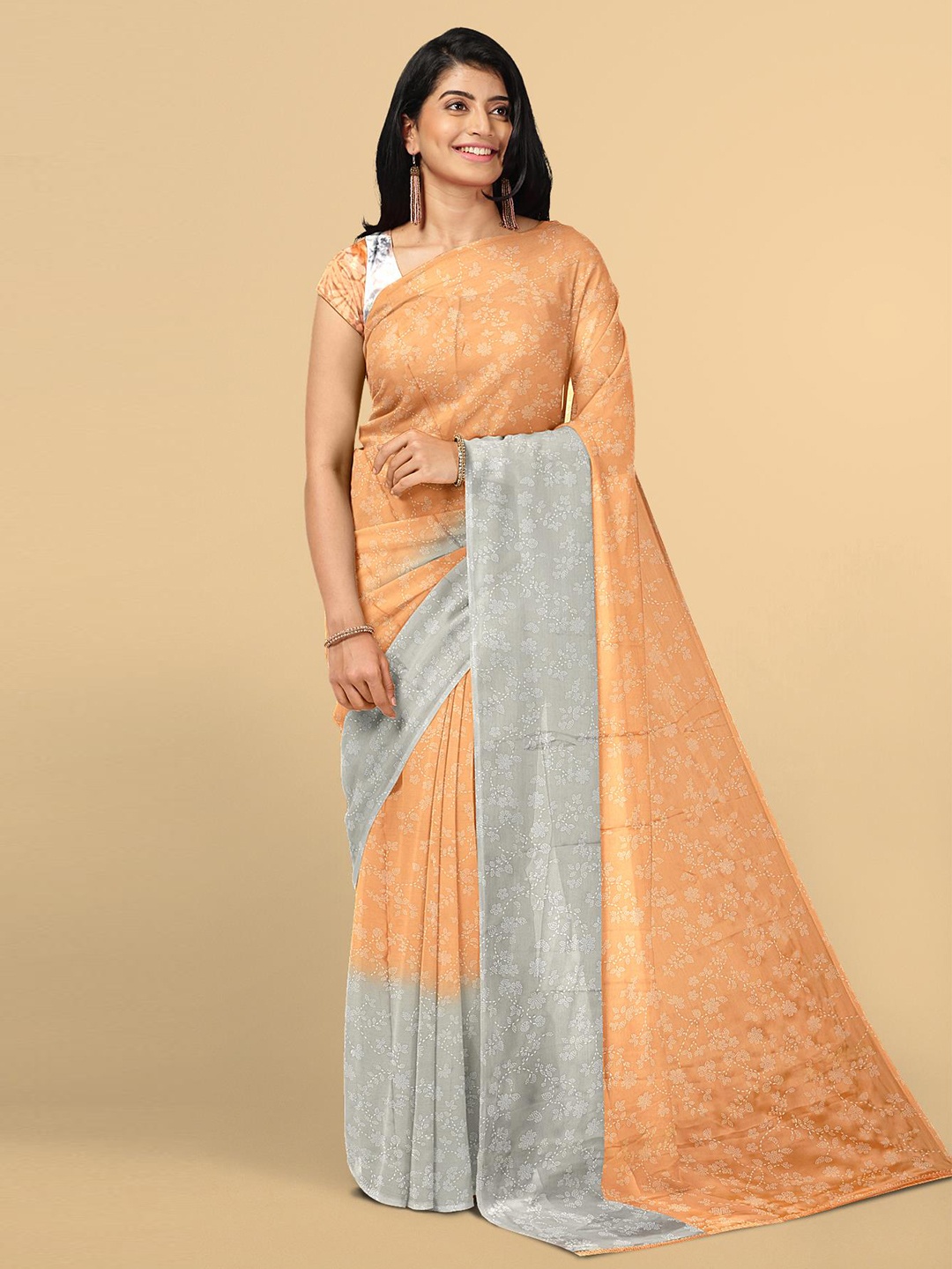 

Kalamandir Orange & Silver-Toned Floral Saree
