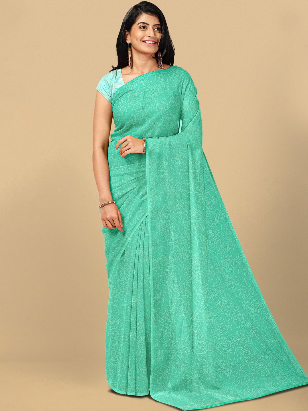 

Kalamandir Sea Green & White Floral Silk Blend Saree