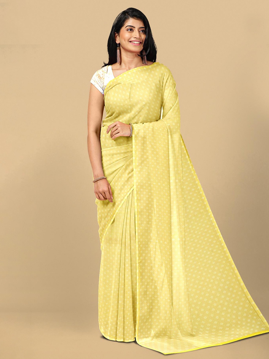 

Kalamandir Yellow Ethnic Motifs Silk Blend Saree