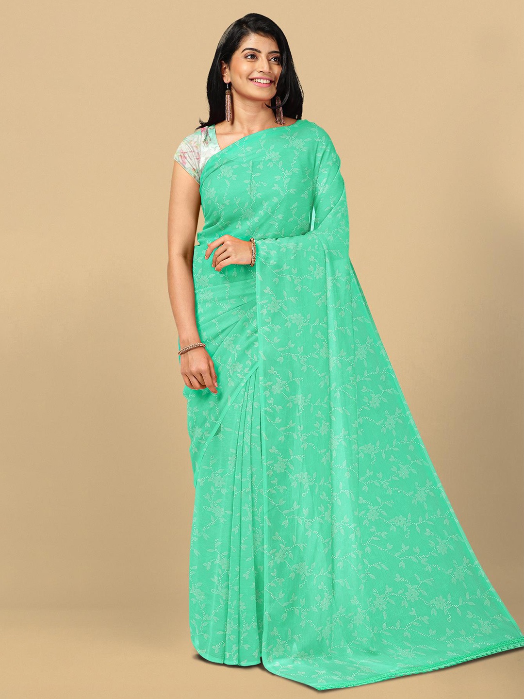 

Kalamandir Sea Green & White Floral Silk Blend Saree