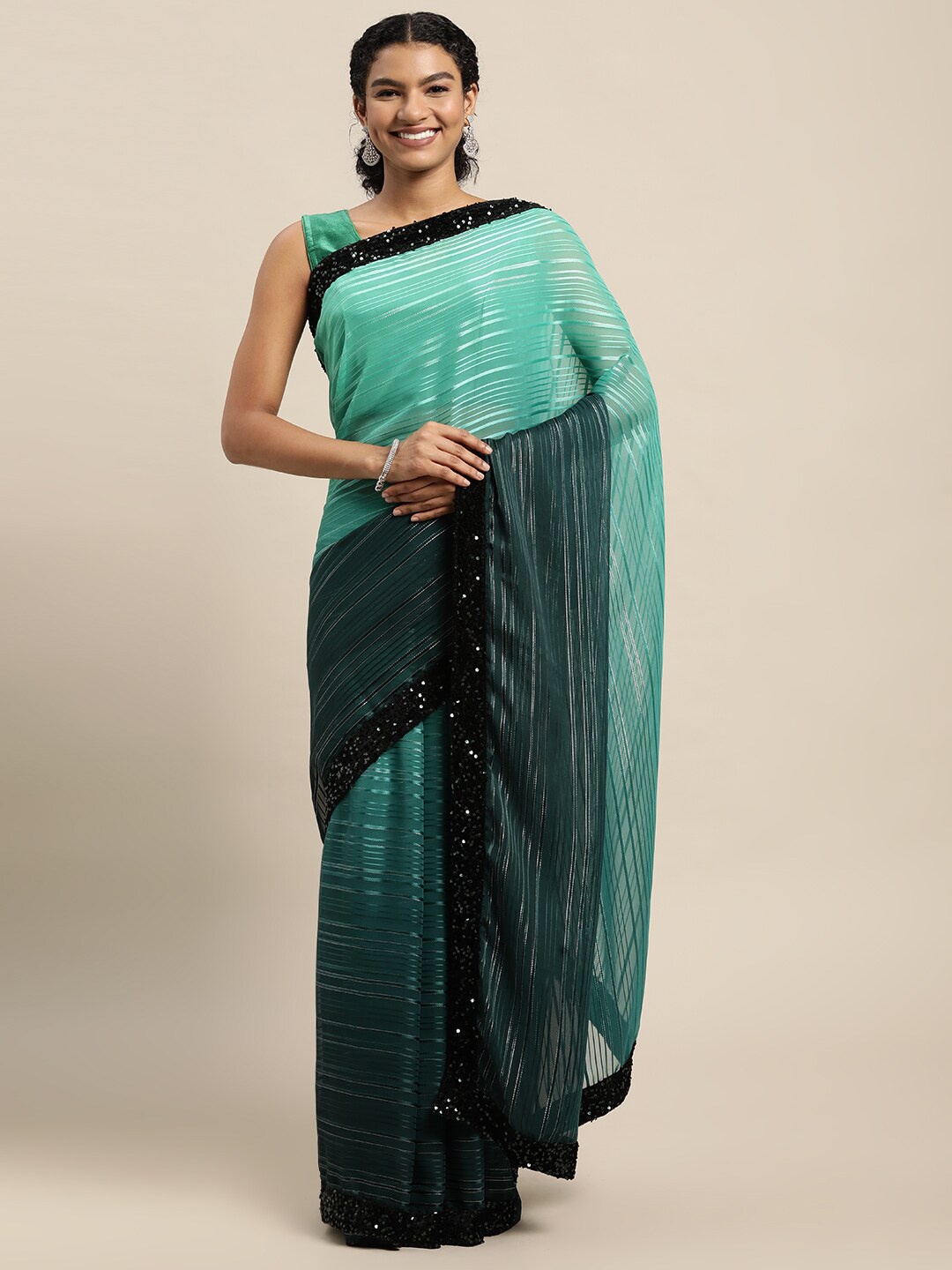 

Mitera Green & Navy Blue Embellished Sequinned Saree