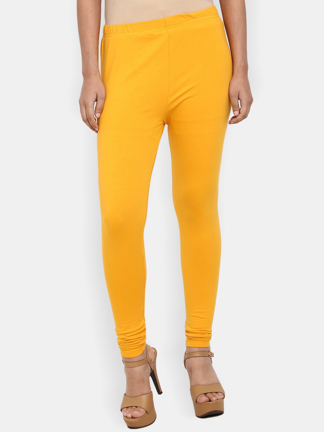 

Desi Mix Women Mustard Yellow Solid Cotton Lycra Leggings
