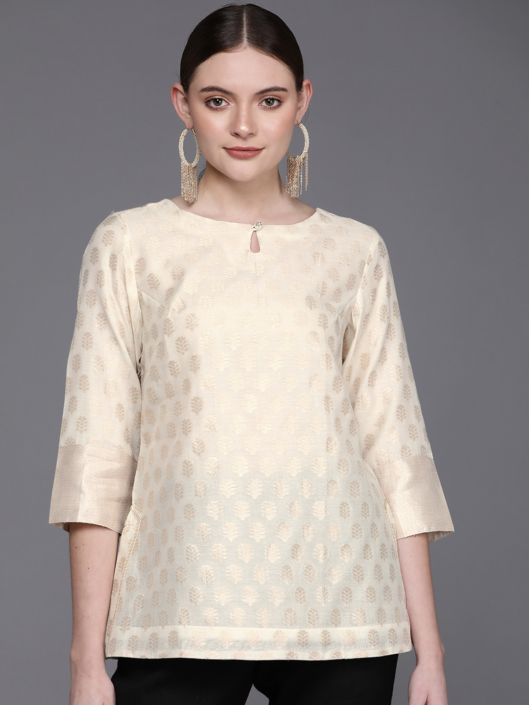 

Fabindia White & Golden Ethnic Motifs Woven Design Kurti