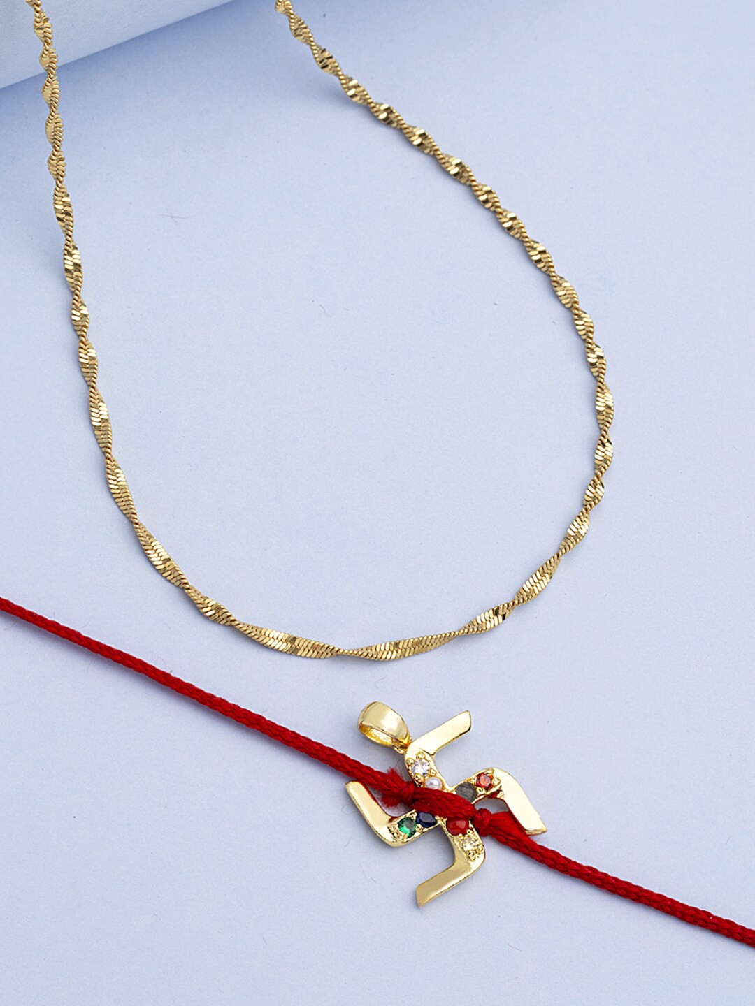 

Voylla Unisex Gold Swastik Pendant Rakhi