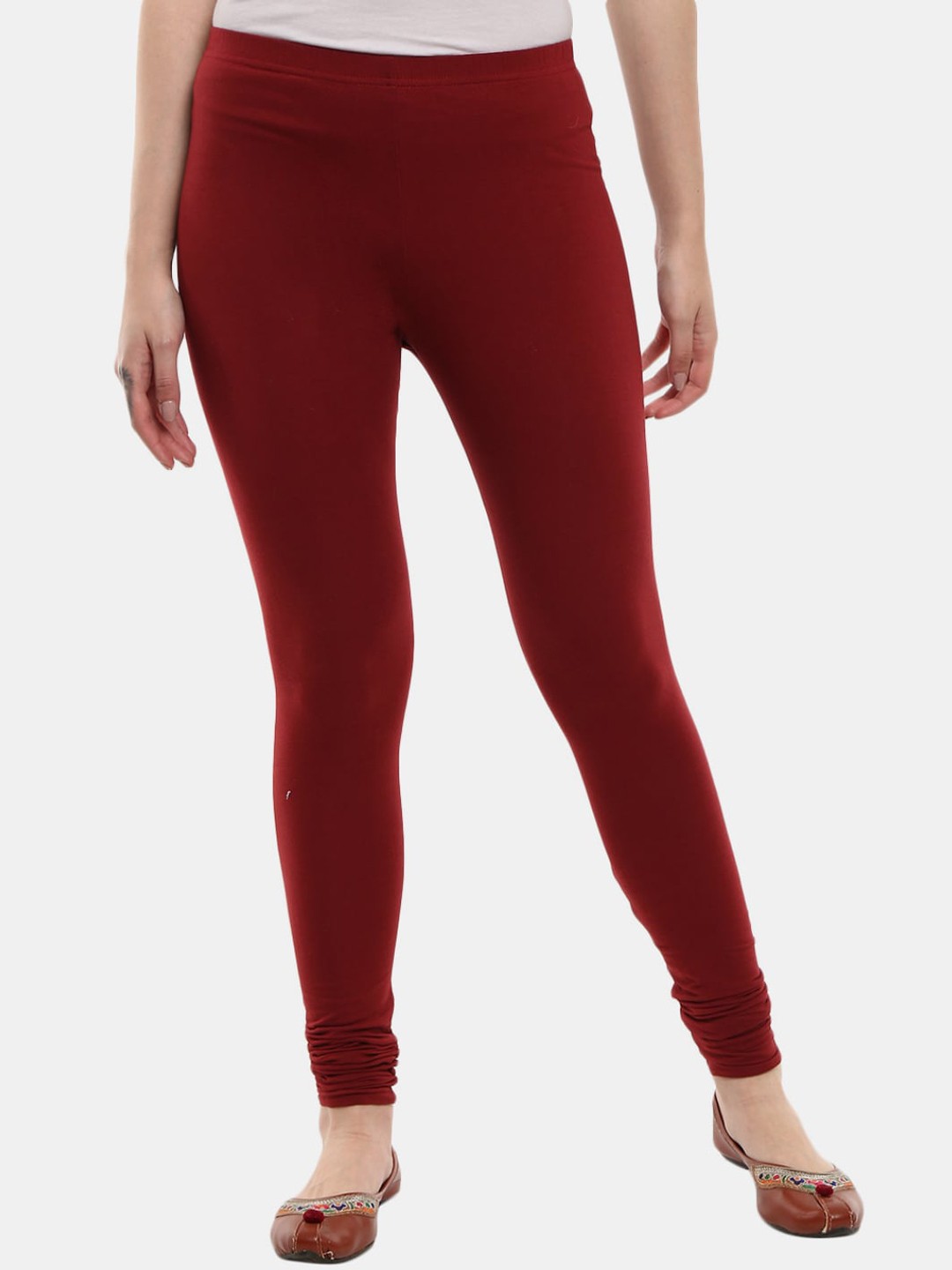 

Desi Mix Women Maroon Solid Churidar Length Leggings