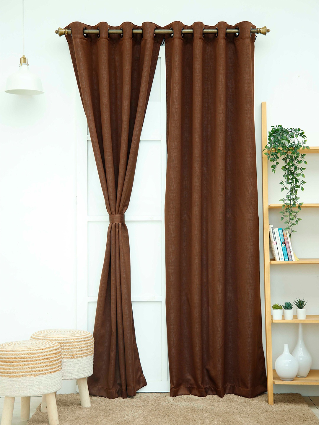 

Ariana Single Brown Black Out Self Design Door Curtain