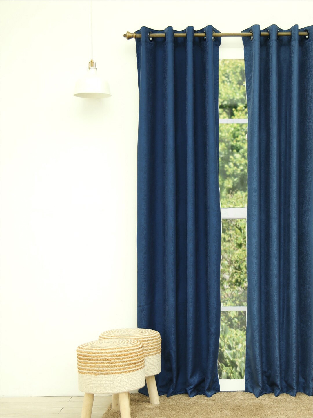 

Ariana Navy Blue Self Design Black Out Door Curtain