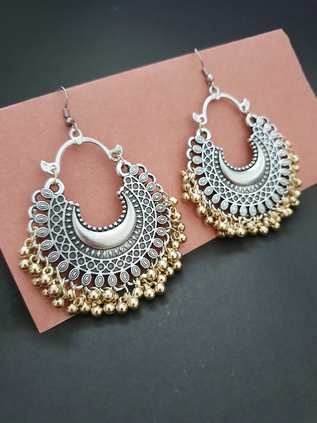 

Infuzze Oxidised Silver & Antique Gold-Toned Crescent-Shaped Chandbalis