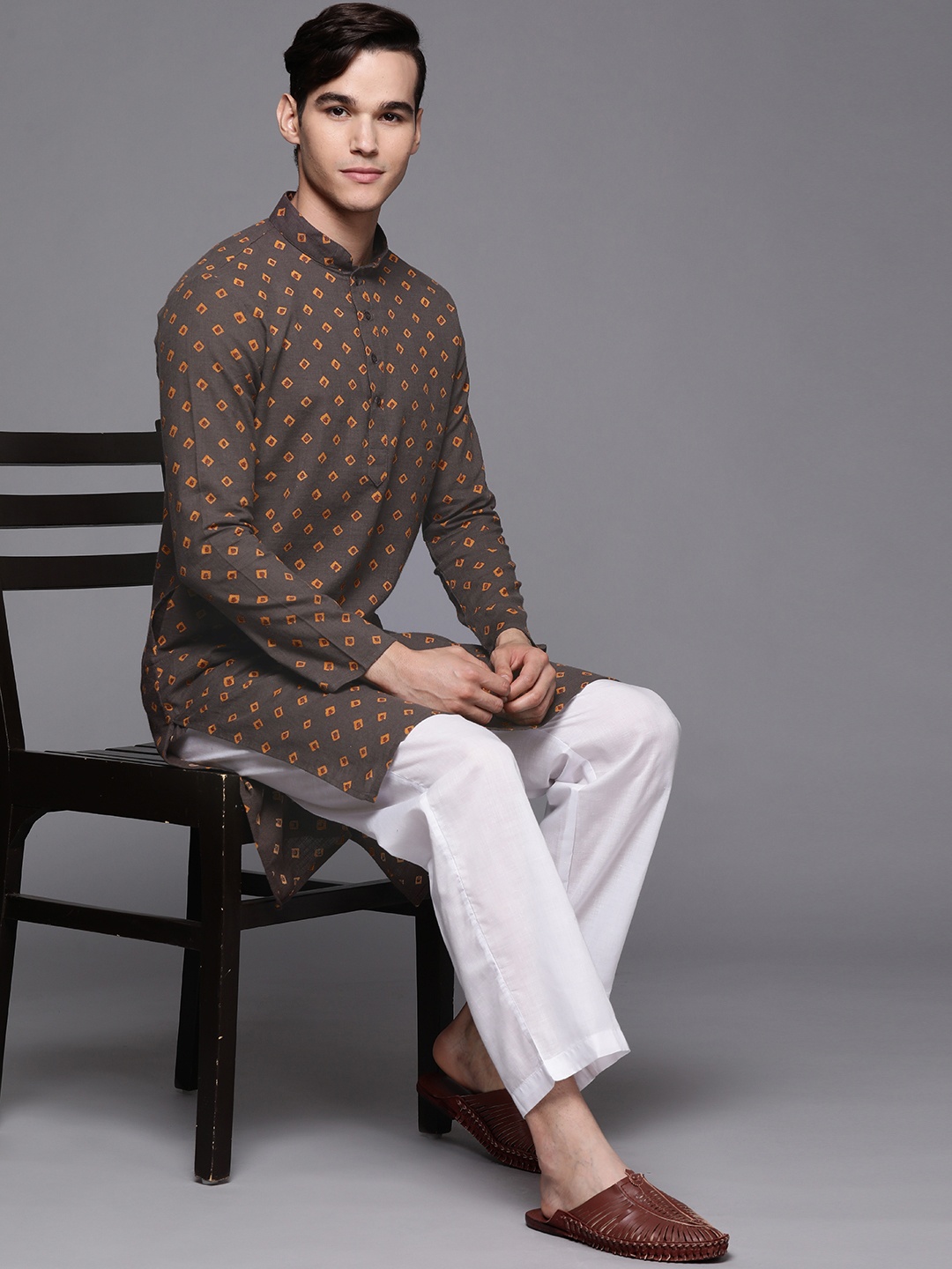 

Manu Men Brown & Mustard Yellow Ethnic Motifs Printed Kurta