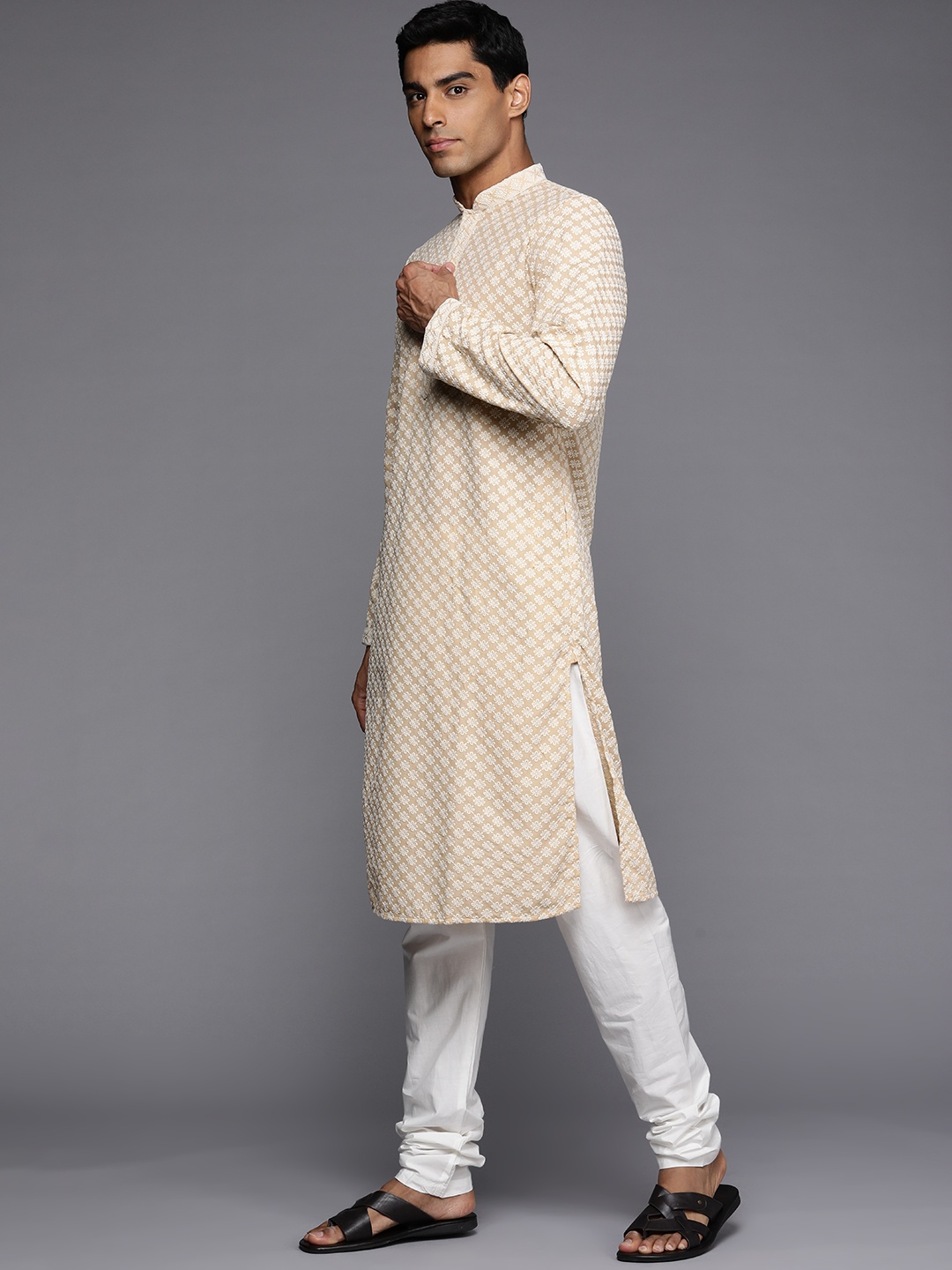

Manu Men Beige & Off-White Ethnic Motifs Embroidered Kurta with Churidar