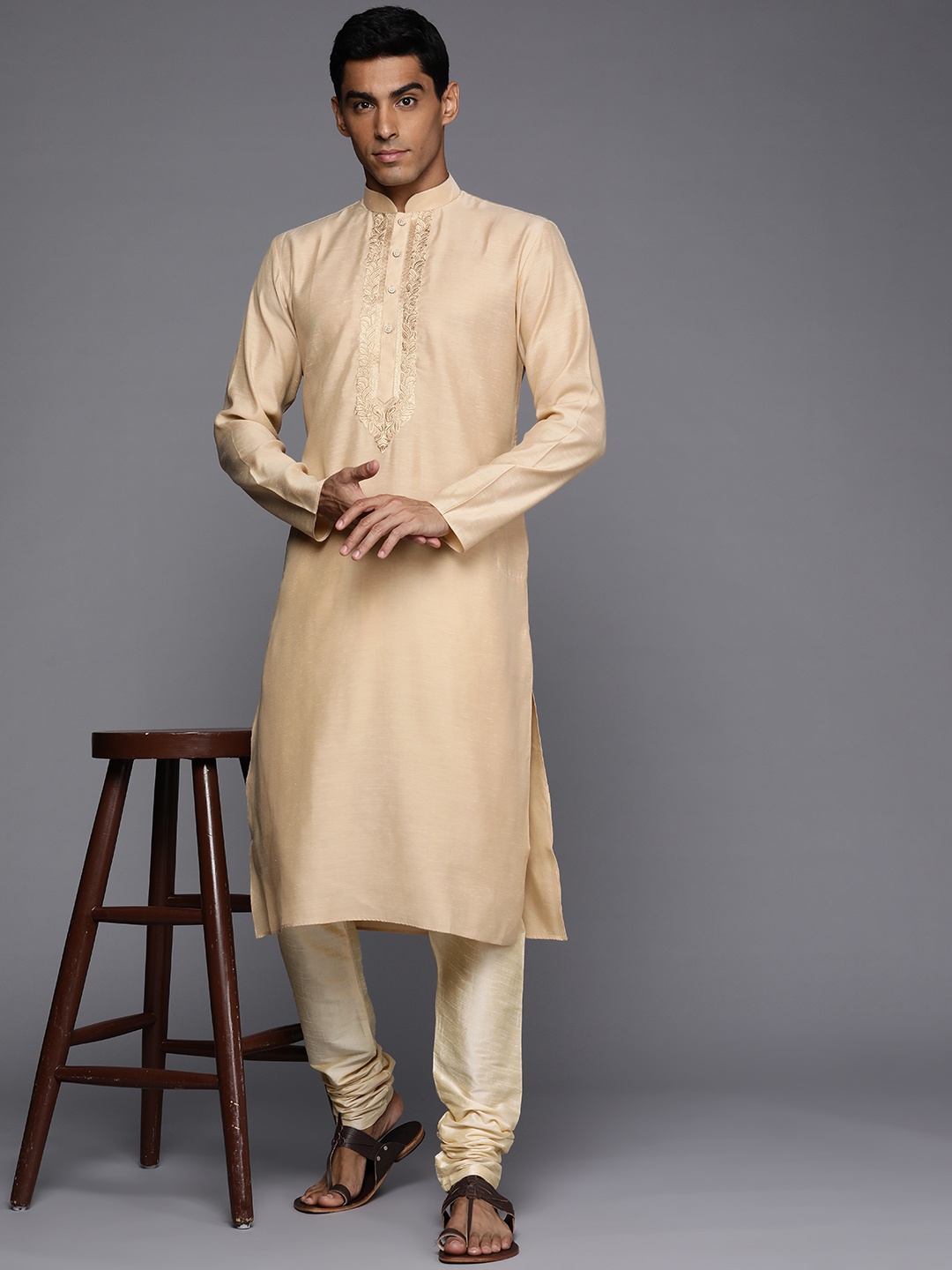 

Manu Men Beige Yoke Embroidered Kurta with Churidar