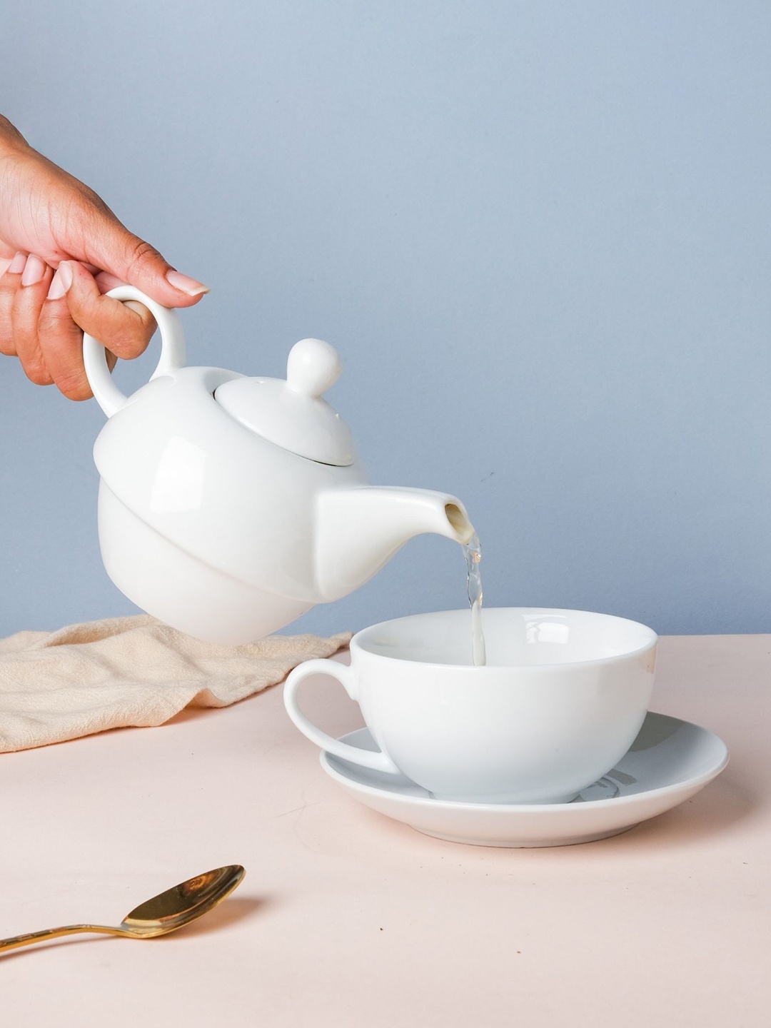

Nestasia White Ceramic Glossy Kettle With Cup & Saucer 200 ML