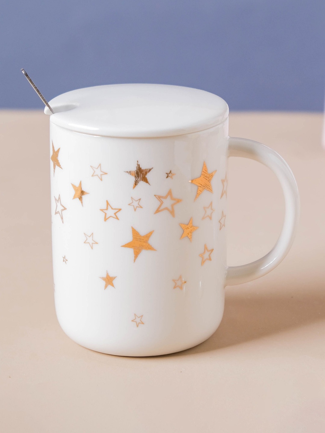 

Nestasia White & Gold Stars Printed Ceramic Mug With Lid & Spoon 320 ml