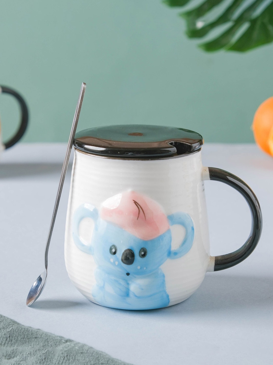 

Nestasia White & Blue Microwave Safe Printed Ceramic Glossy Cup & Spoon 450 ml