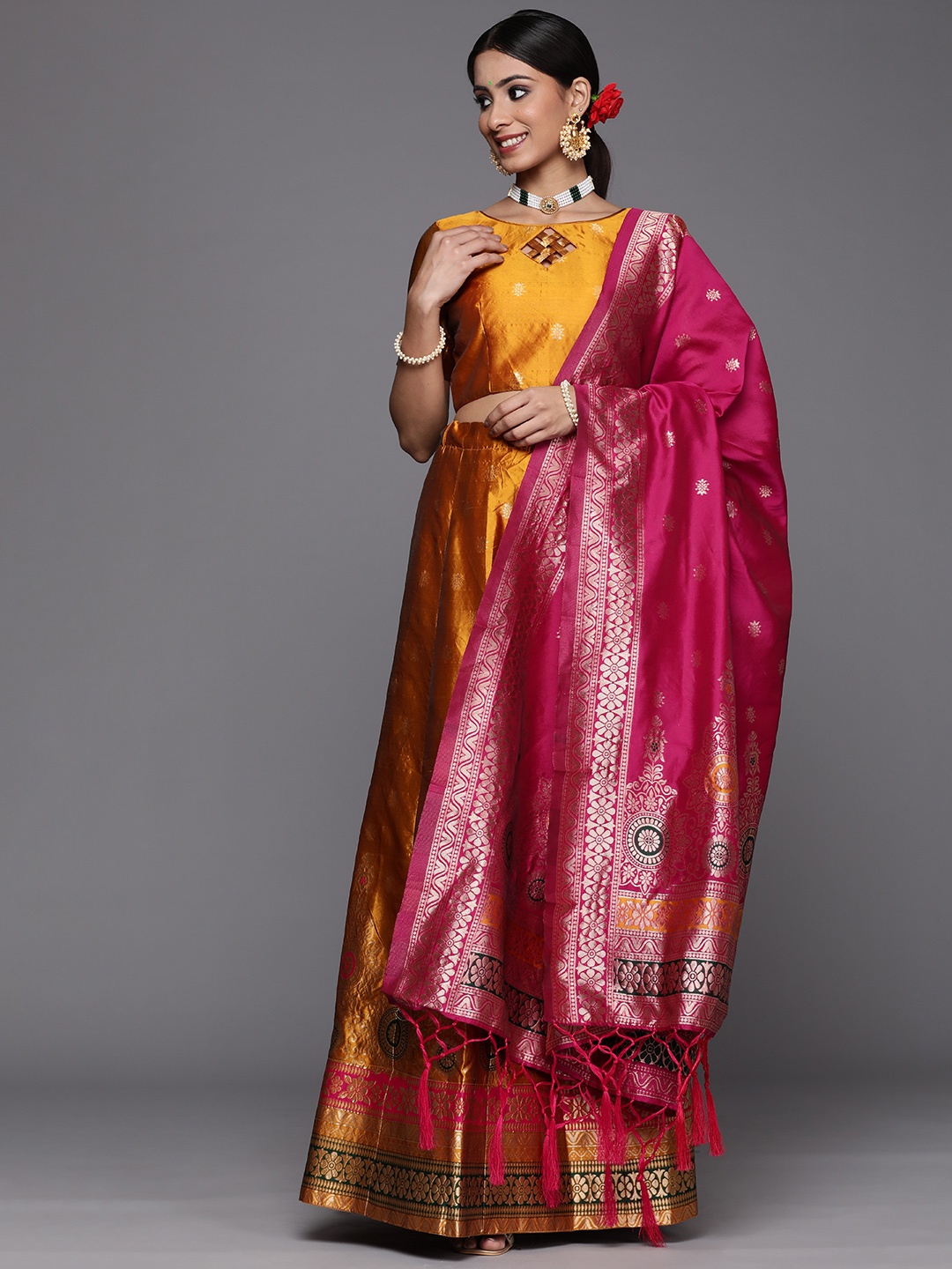 

Mitera Women Mustard & Gold-Toned Semi-Stitched Lehenga Unstitched Blouse & Dupatta