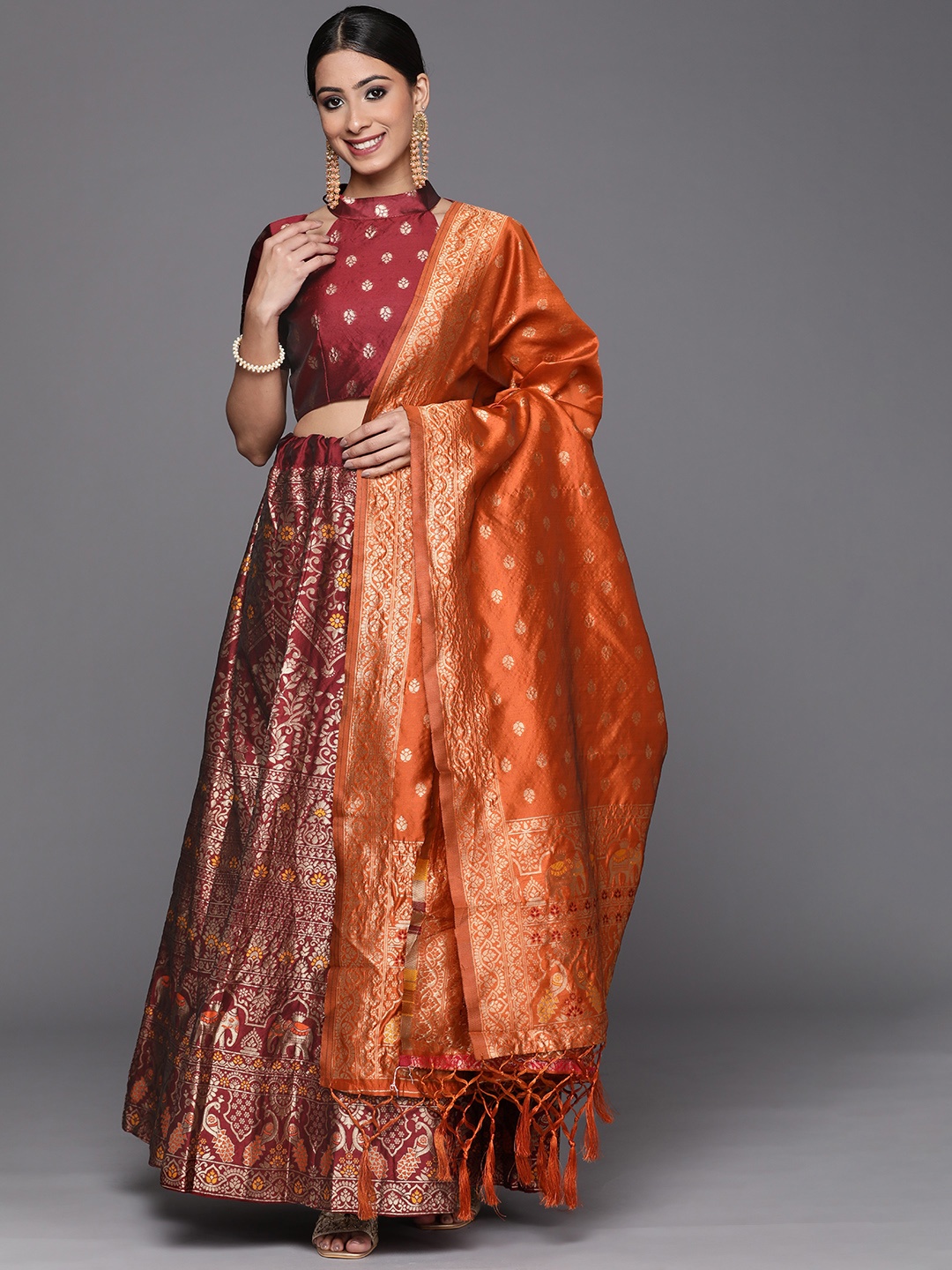 

Mitera Women Magenta & Gold-Toned Semi-Stitched Lehenga Unstitched Blouse & Dupatta