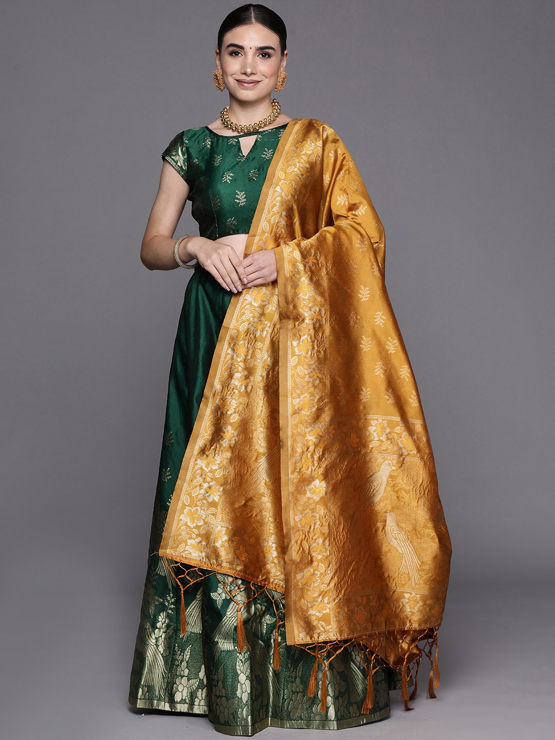 

Mitera Women Green &Gold-Toned Kalamkari Semi-Stitched Lehenga Unstitched Blouse & Dupatta