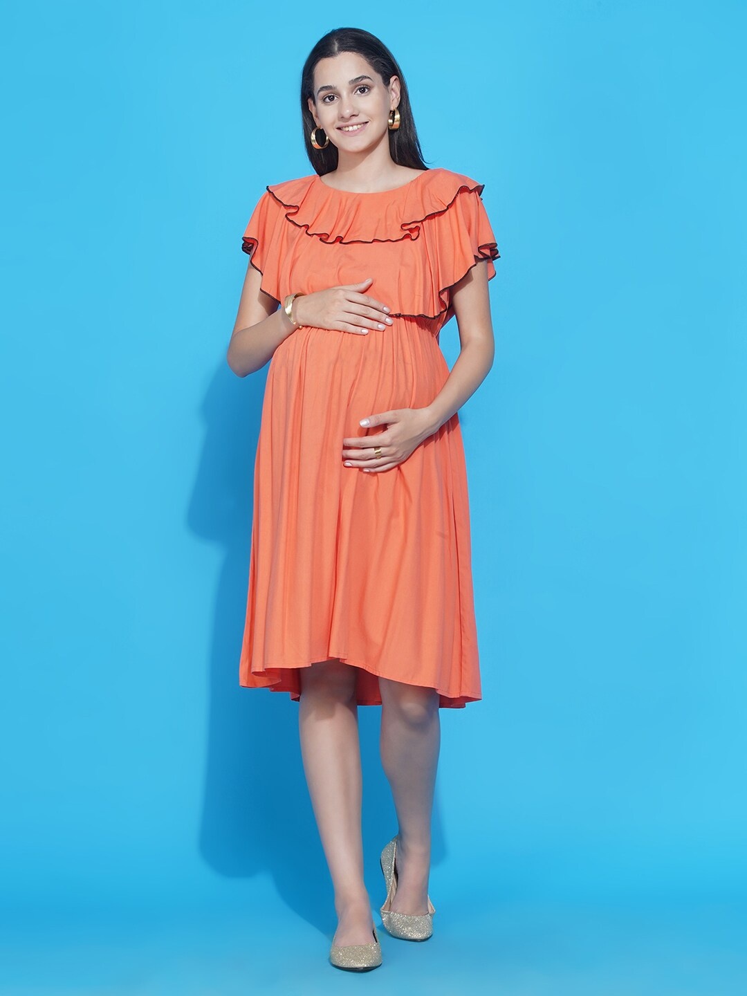 

Mine4Nine Women Peach-Coloured Solid Maternity Dress