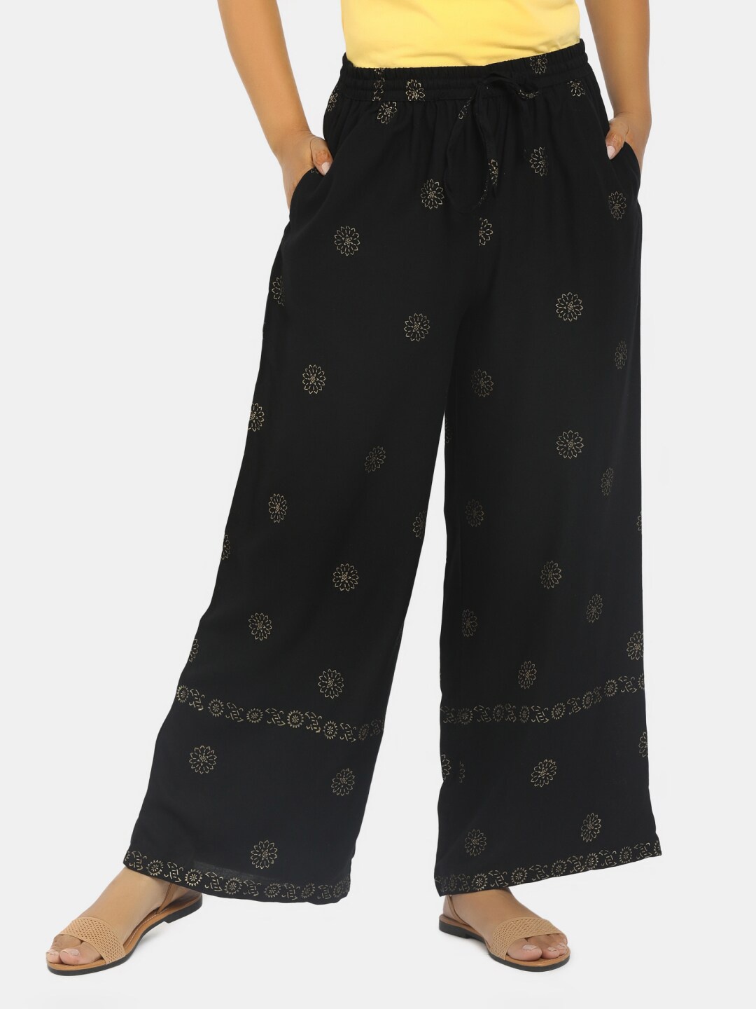 

V-Mart Women Black & Gold-Toned Floral Printed Palazzos