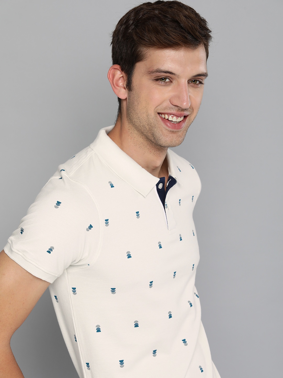 

Mast & Harbour Men Off White & Teal Blue Pure Cotton Printed Polo Collar T-shirt