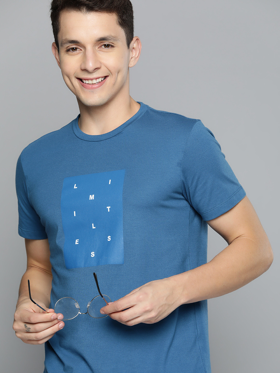 

Mast & Harbour Men Blue Typography Printed T-shirt