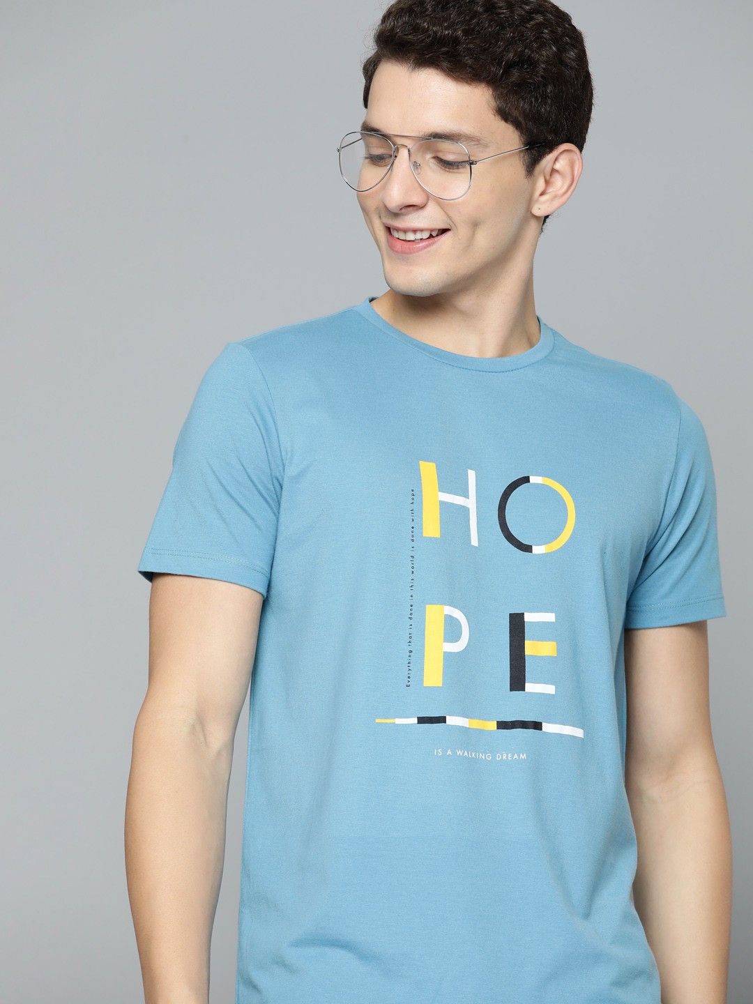 

Mast & Harbour Men Blue Typography Printed T-shirt