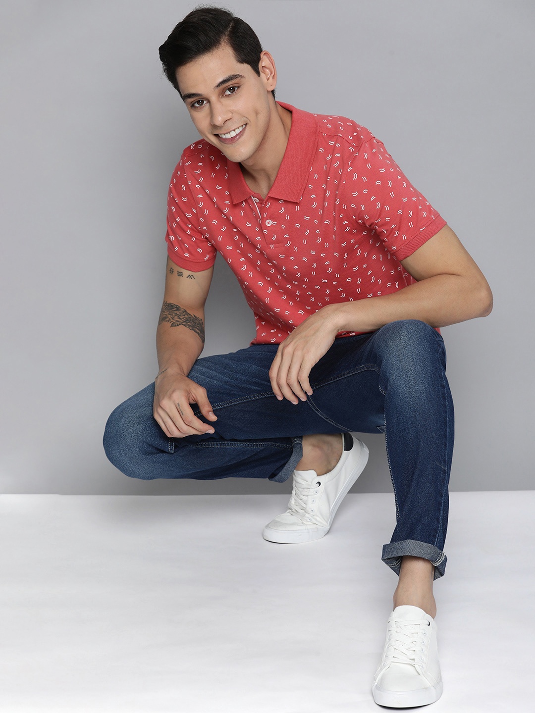 

Mast & Harbour Men Coral Red & White Printed Polo Collar Pure Cotton T-shirt