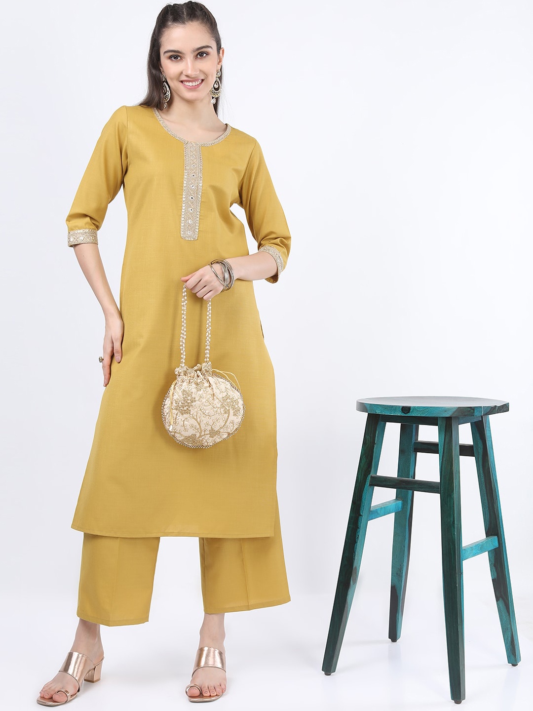 

KETCH Women Yellow Floral Embroidered Kurta with Palazzos